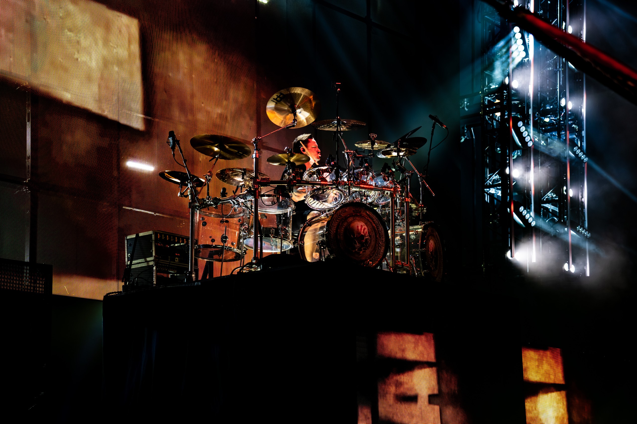 Five Finger Death Punch drummer performing behind his kit. Five Finger Death Punch at Coastal Credit Union Music Park, Raleigh, October 14, 2026.