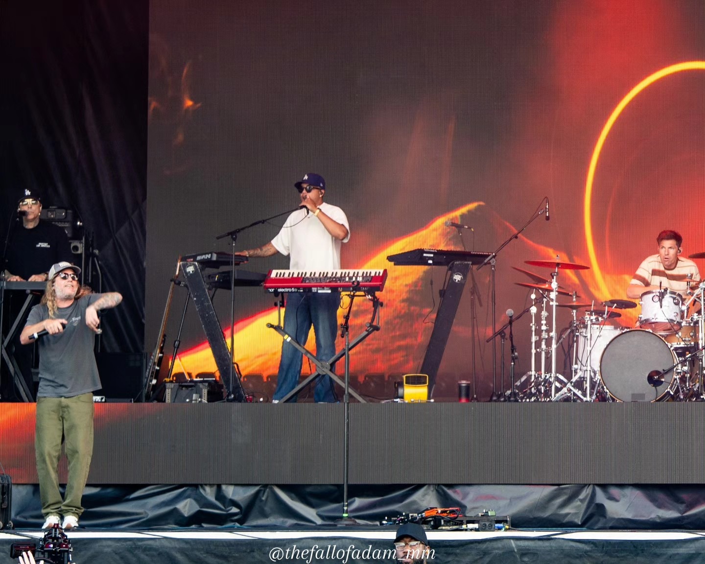 Dirty Heads band members spread across the festival stage.