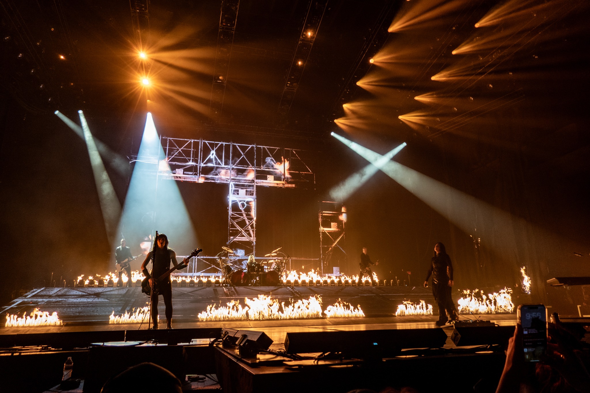 Wide view of the Evanescence stage under warm light.