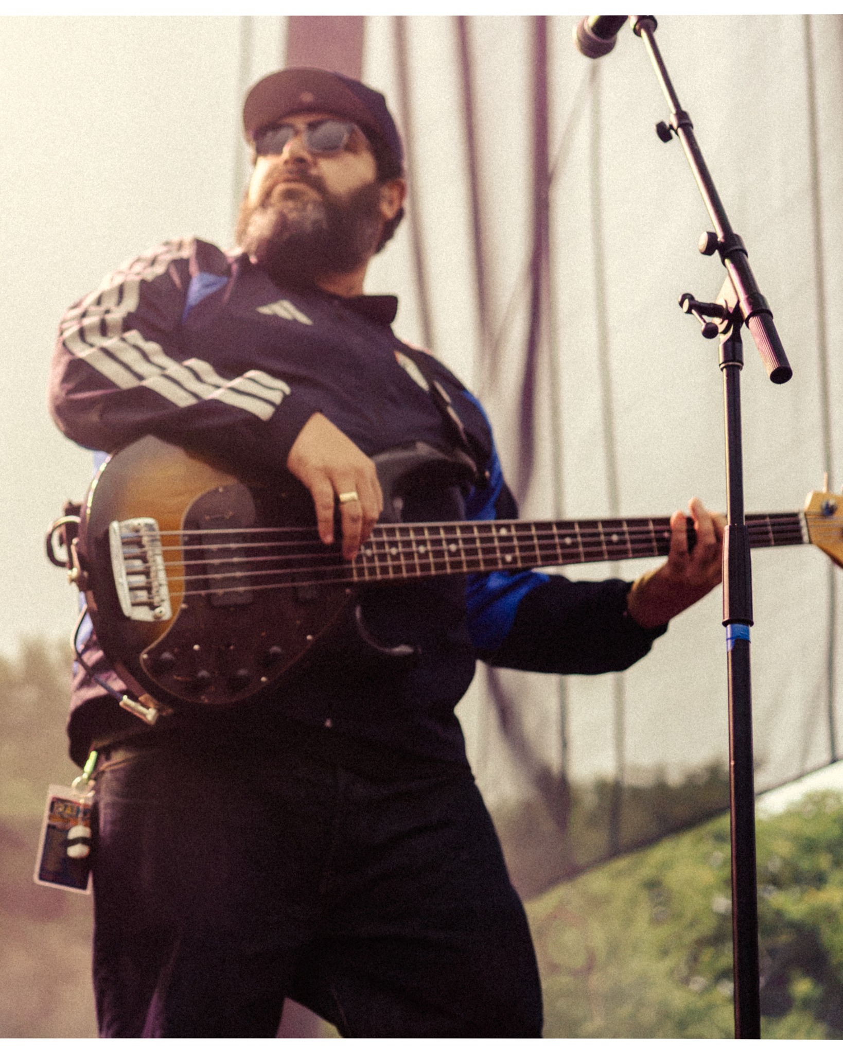 Tribal Seeds bassist performing beside his amplifier.