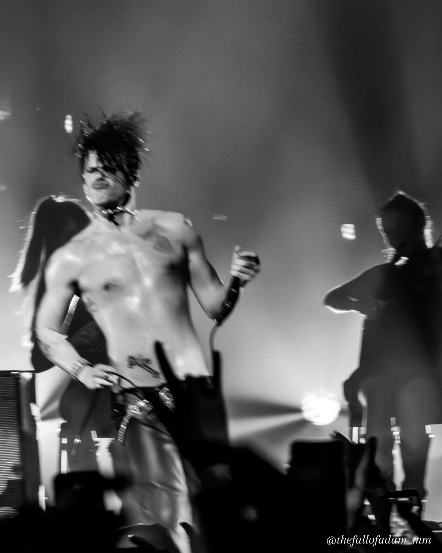 Black and white photograph of Yungblud performing.
