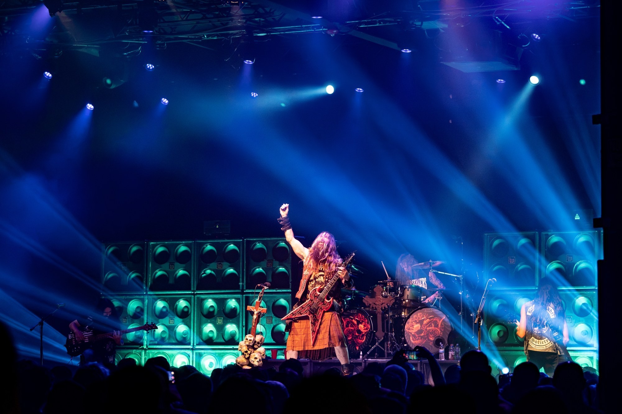 Wide view of Black Label Society performing beneath blue lights at The Ritz.