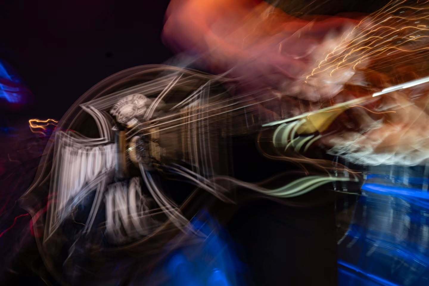 Motion-blurred photograph of Zakk Wylde playing guitar at The Ritz.