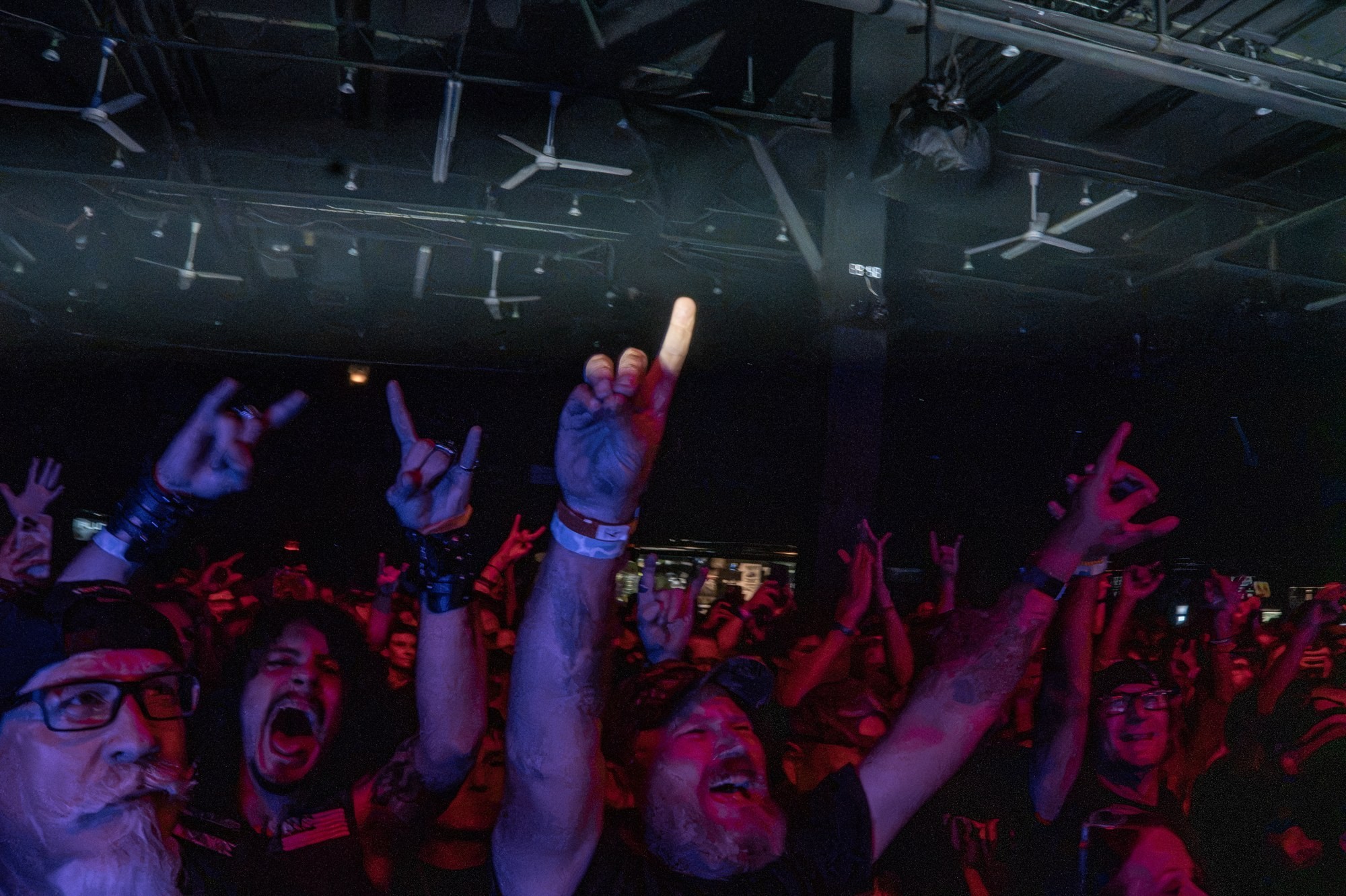 Fans raising their hands during Black Label Society at The Ritz.