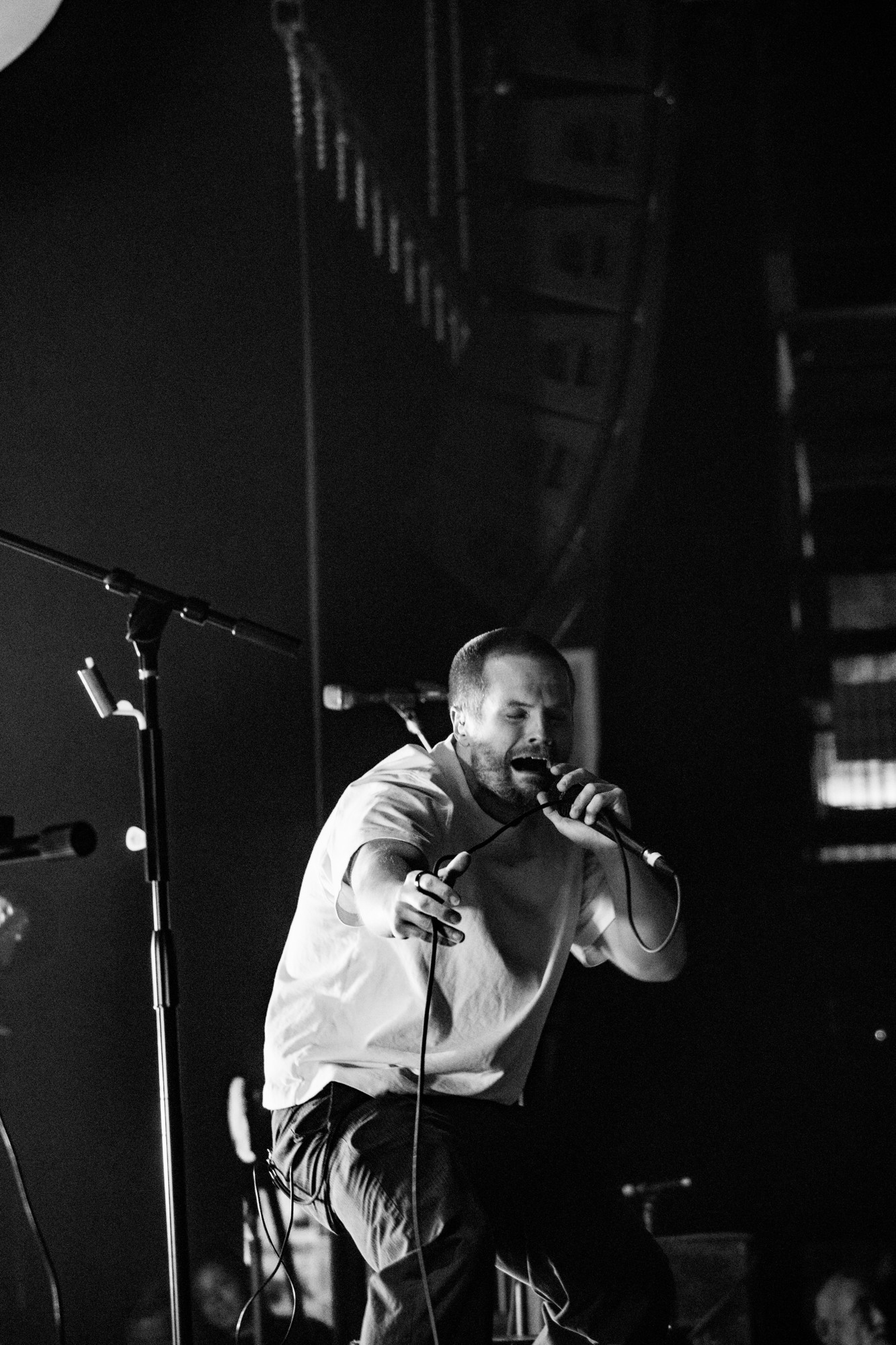 Black and white photograph of the Dead Poet Society vocalist.