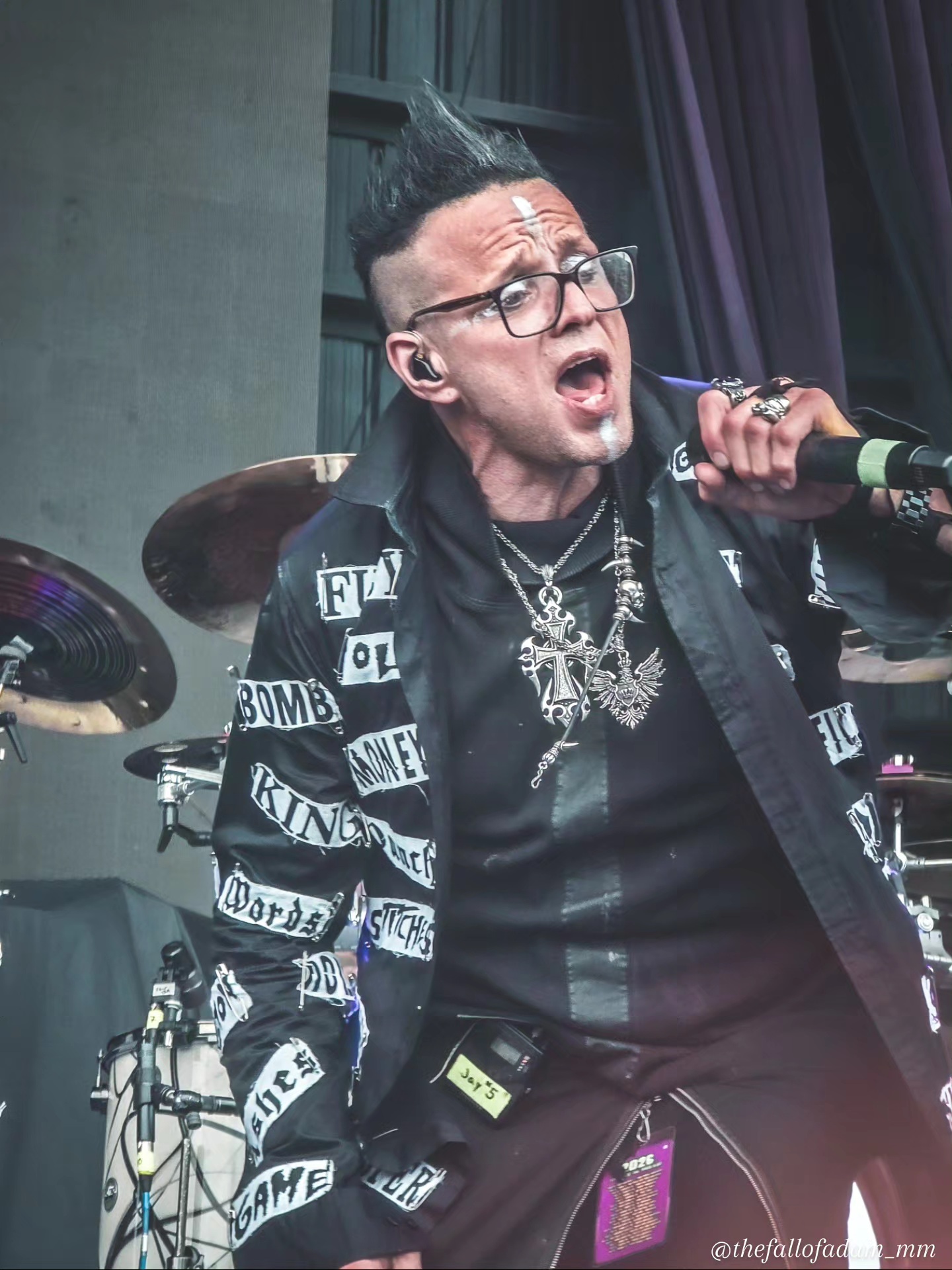 Jay Gordon singing into a microphone during Orgy’s Tampa performance.