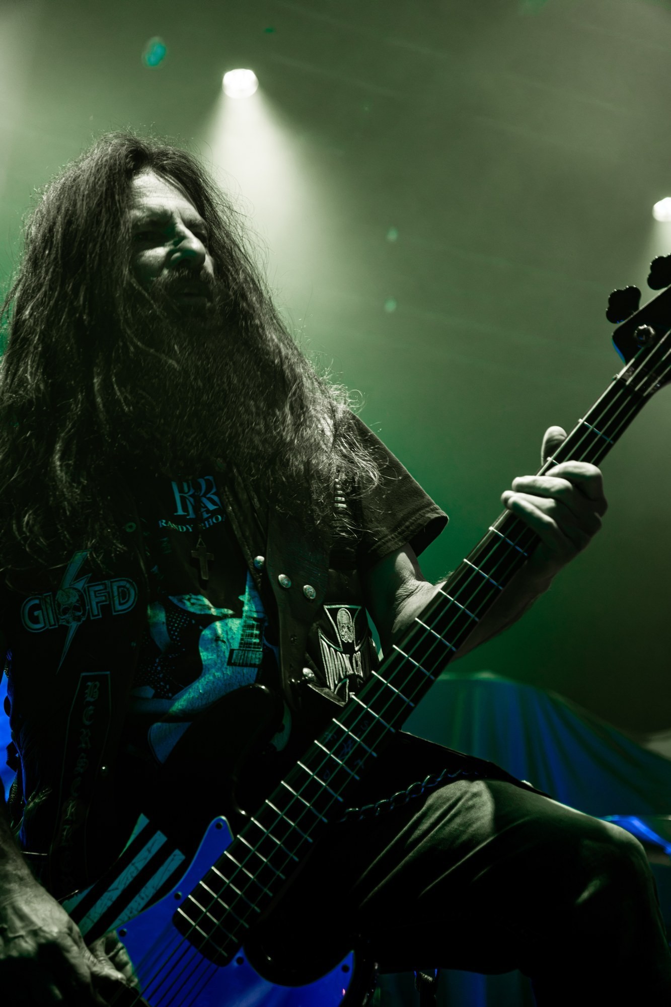 Zakk Sabbath musician playing under green stage lights at The Ritz.